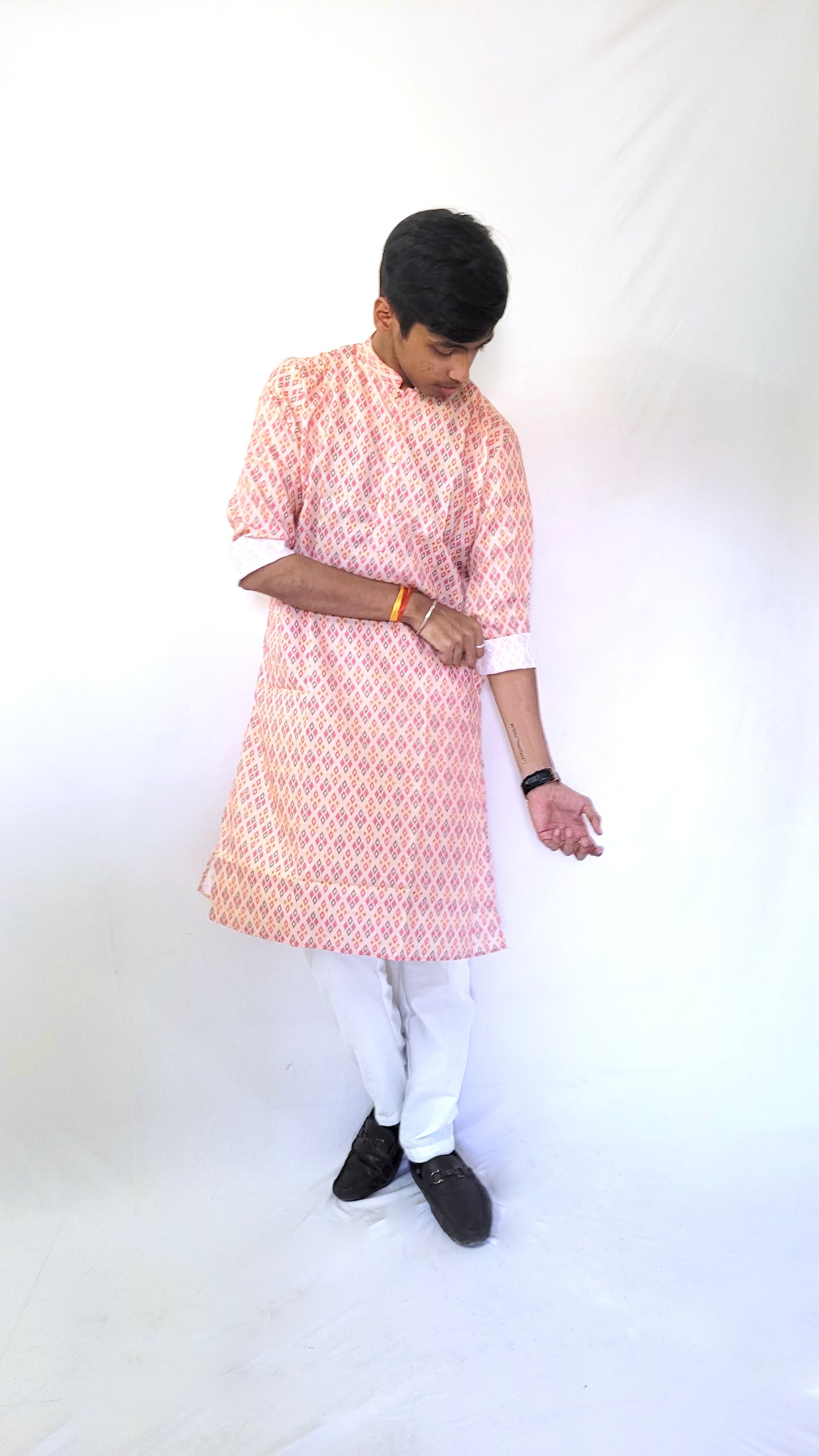 Full-body front view of multicolor diamond print cotton kurta – vibrant men’s festive wear with breathable fabric