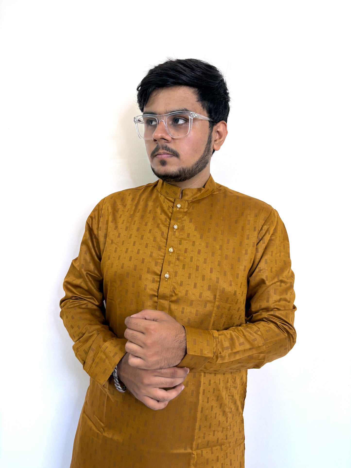 Model styling mustard yellow kurta for Diwali or wedding event – elegant ethnic fashion for men