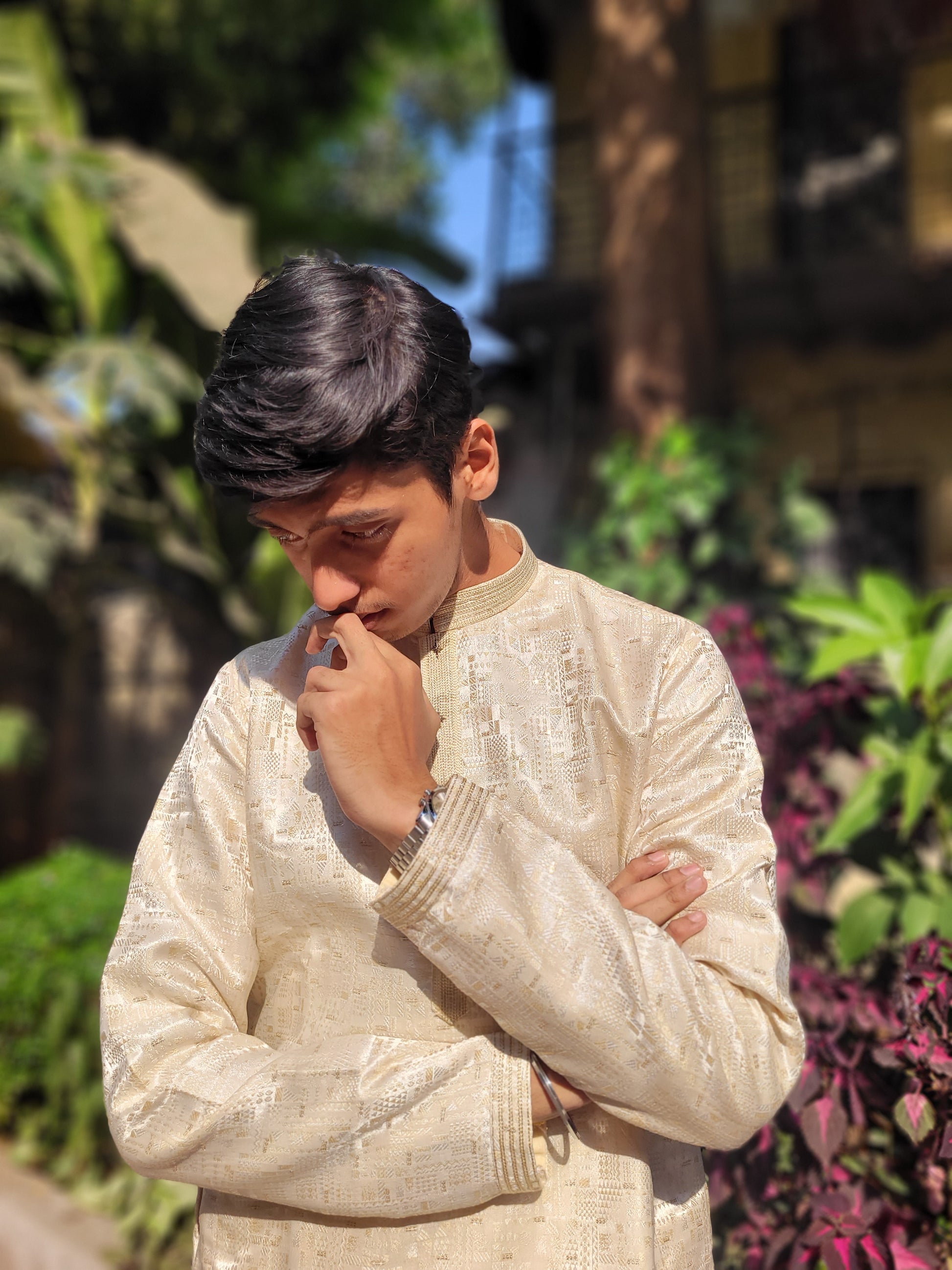 Bottom angle of beige jacquard kurta – showcasing geometric texture and elegant fabric drape