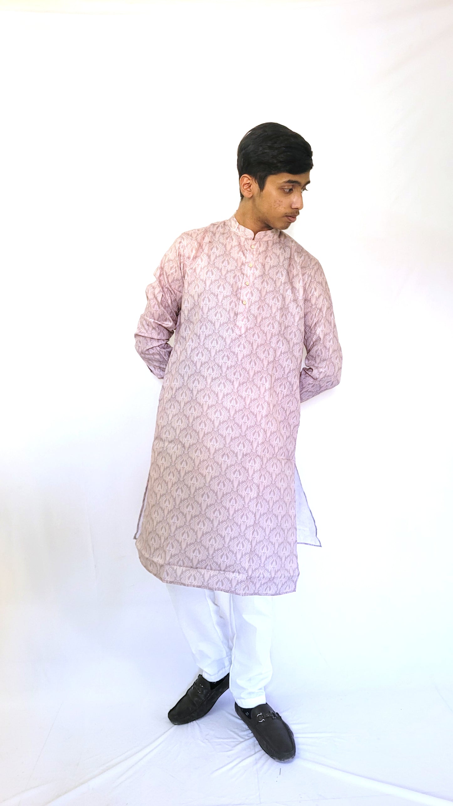 Full body view of dusty pink floral cotton kurta – men’s ethnic wear with soft pastel prints, looking bottom-left