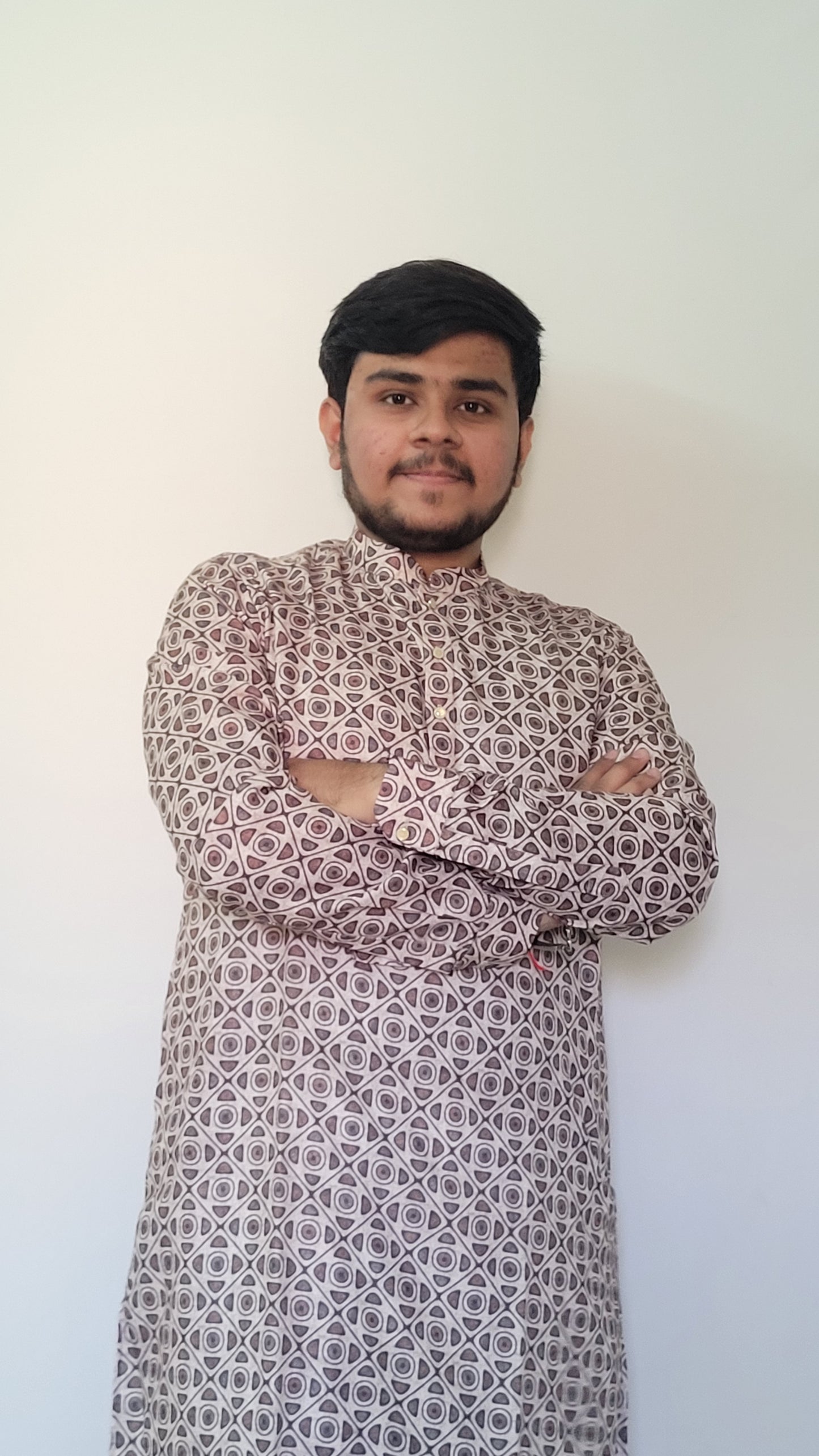 Half-body front view of men’s cotton kurta with earthy digital geometric print – casual festive look