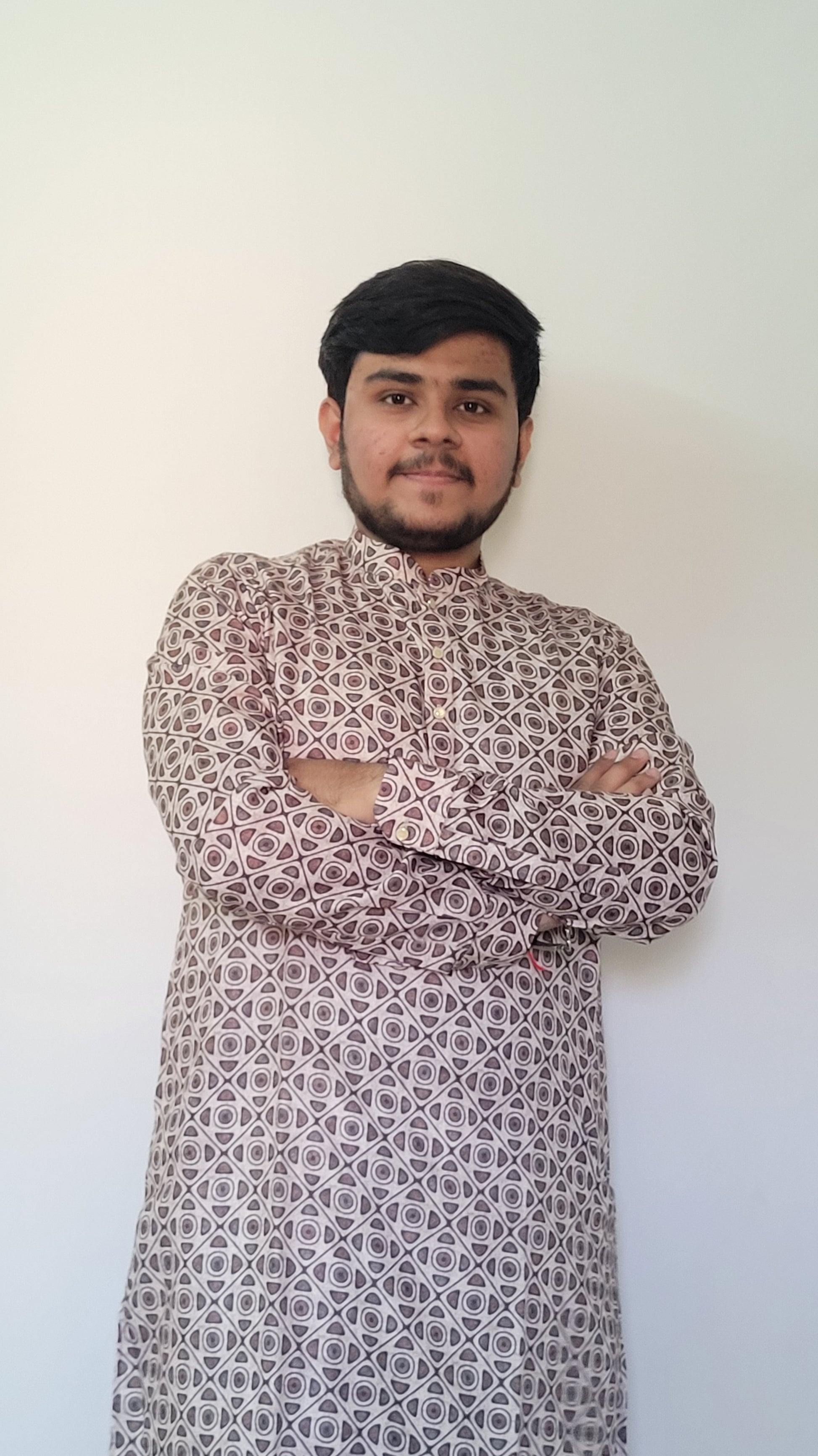 Half-body front view of men’s cotton kurta with earthy digital geometric print – casual festive look