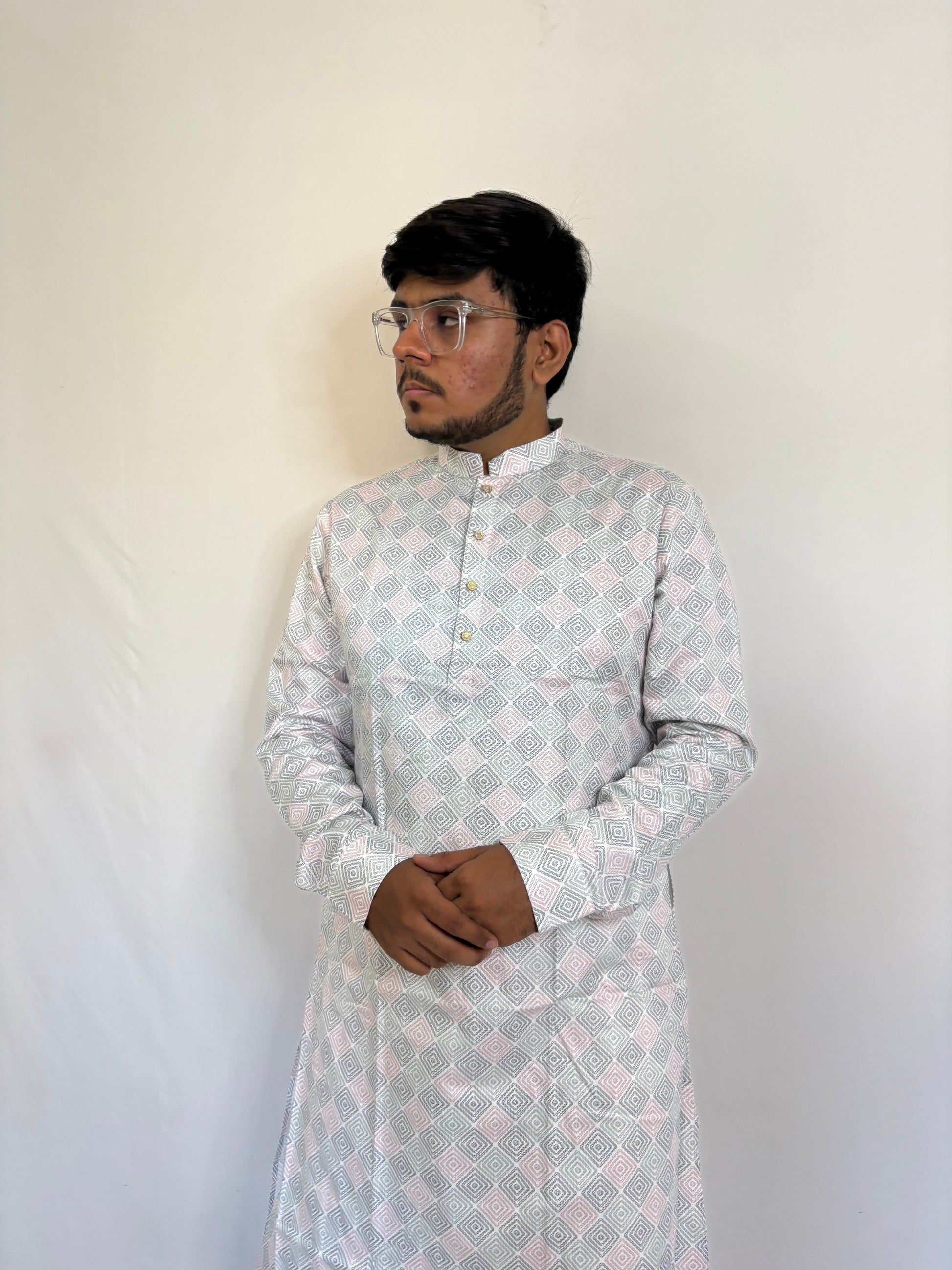 Side view of Giza cotton kurta with dusty pink geometric print – casual festive outfit for men
