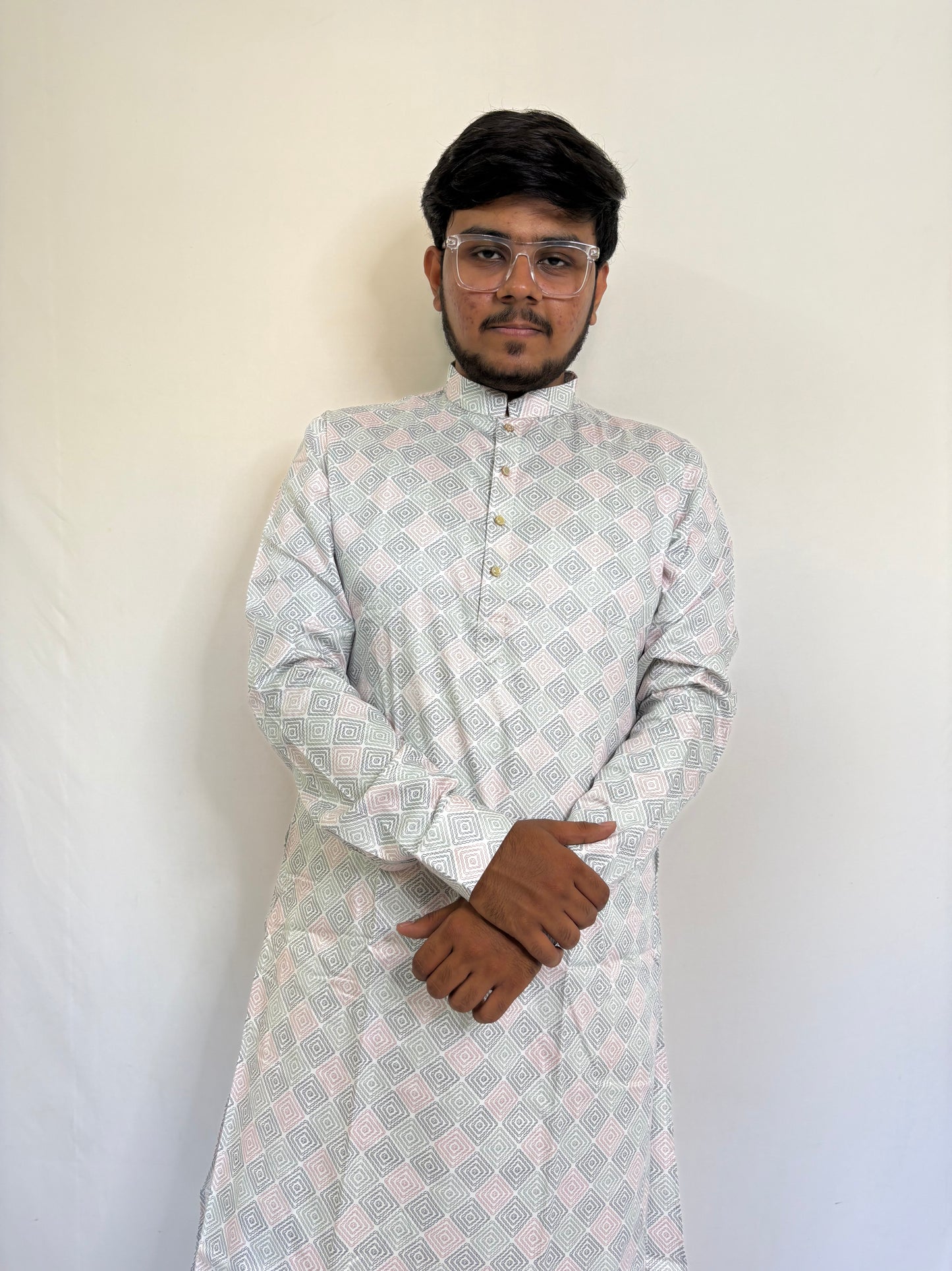 Model styling pastel geometric kurta for family gathering or ethnic office look
