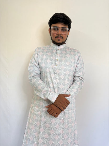 Model styling pastel geometric kurta for family gathering or ethnic office look