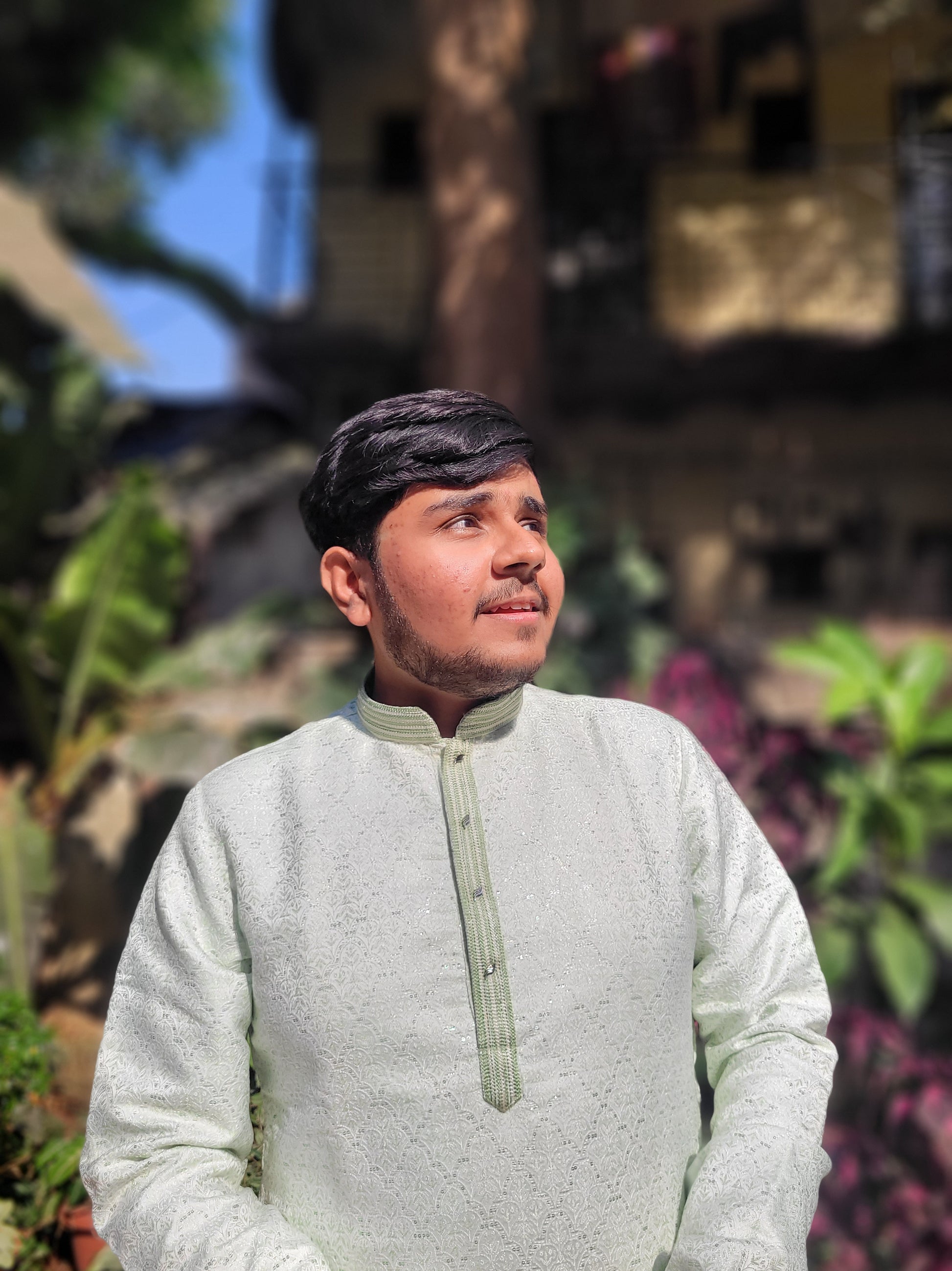 Left angle of men’s ivory mint jacquard kurta – soft shimmer with intricate traditional weave