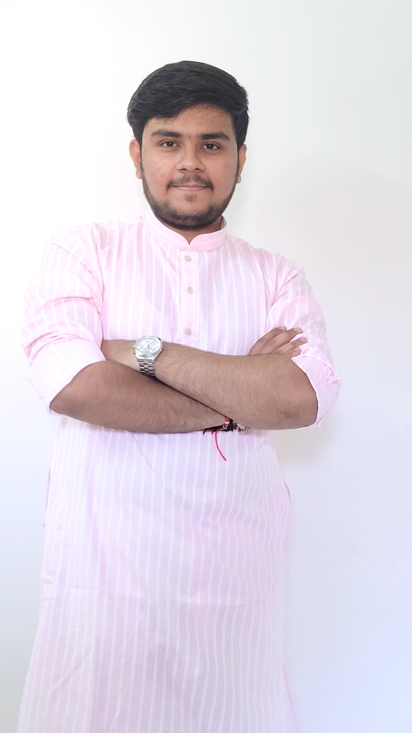 Front half-body shot of pink striped cotton kurta – soft and stylish Indian menswear with classic mandarin collar