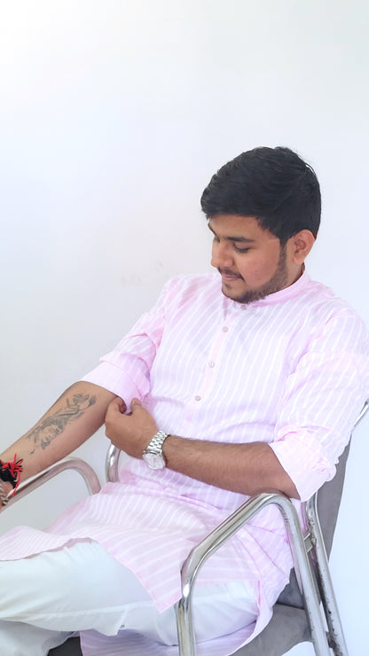 Angled right half-body profile of pastel pink kurta with white vertical stripes – modern ethnic kurta for men