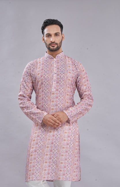 Intricate traditional print on pastel pink kurta – elegant ethnic detailing