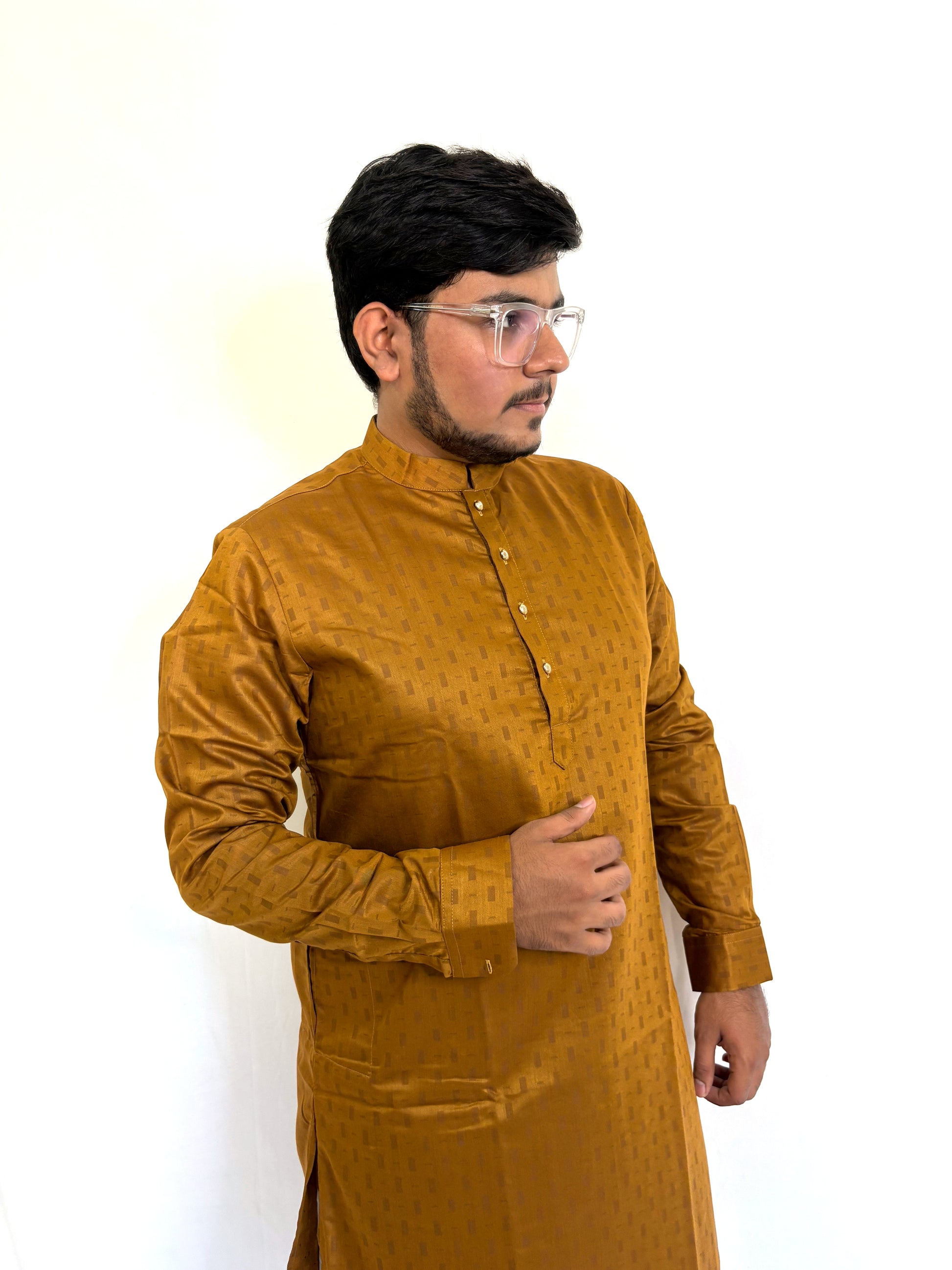Model styling mustard yellow kurta for Diwali or wedding event – elegant ethnic fashion for men
