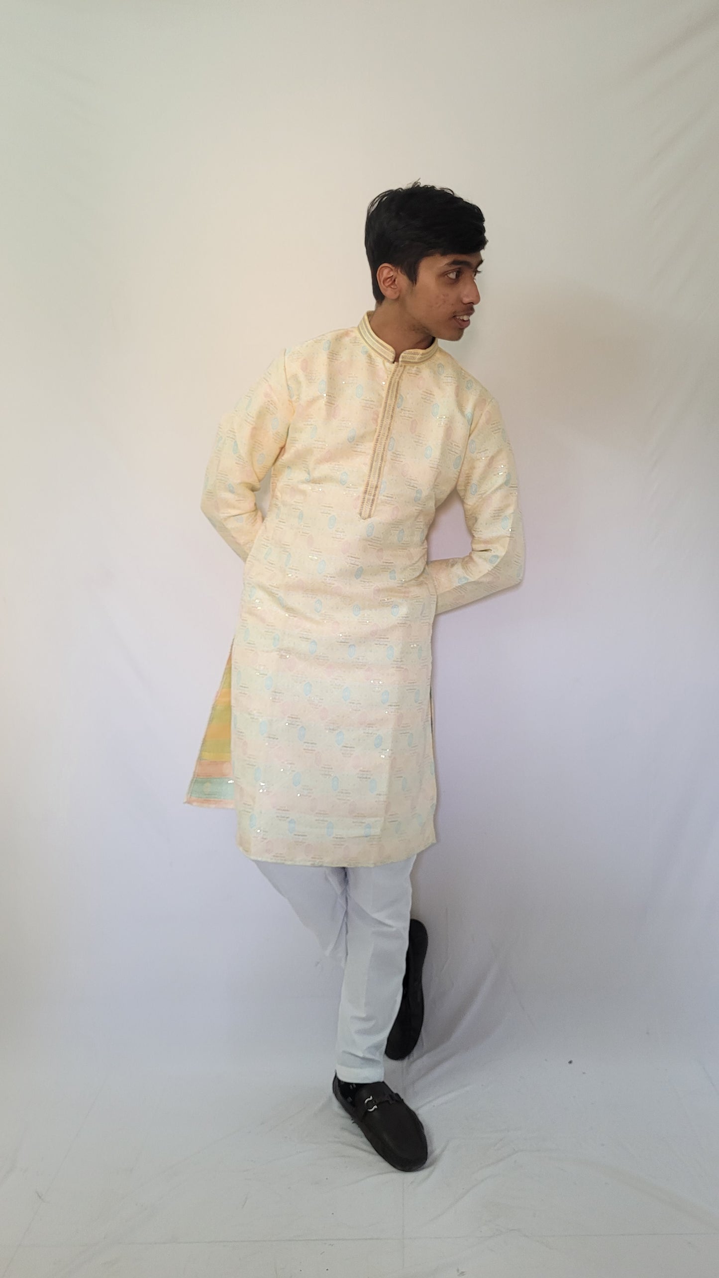 Full body left angle of men’s pastel jacquard kurta – festive ethnic outfit with soft blue and pink details
