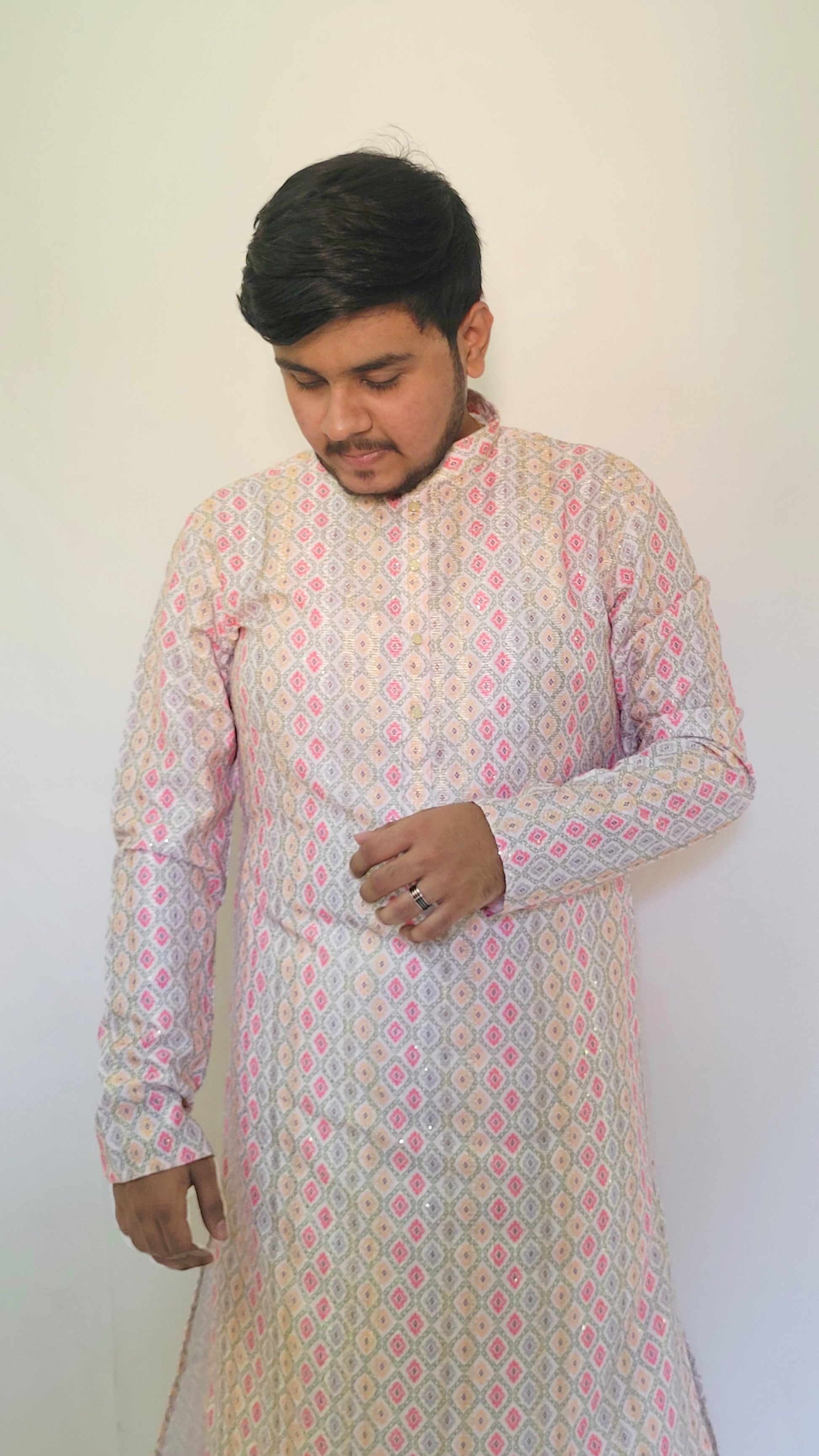 Right-bottom-left angled view of diamond patterned rayon kurta – modern festive men’s wear with subtle sheen