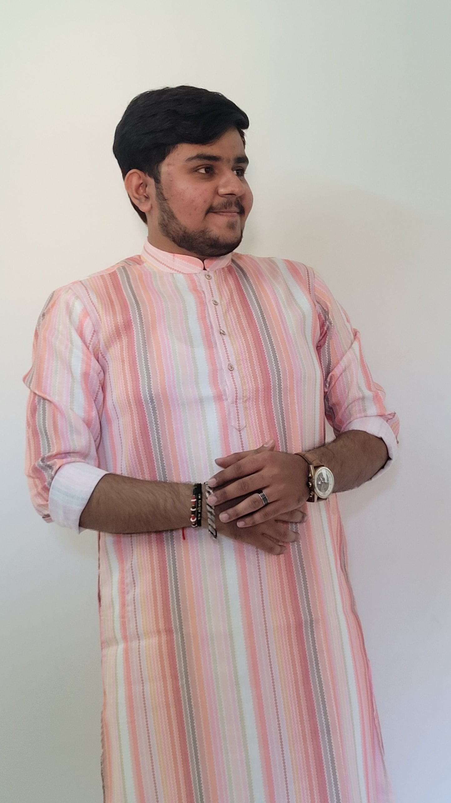 Seated right angle of pastel striped kurta in breathable cotton – daytime ethnic styling for men