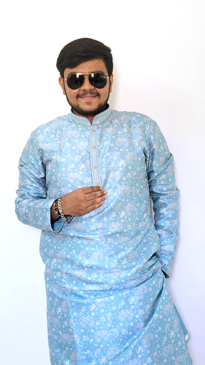 Sky blue paisley jacquard kurta styled with sunglasses – modern ethnic menswear for haldi and pooja