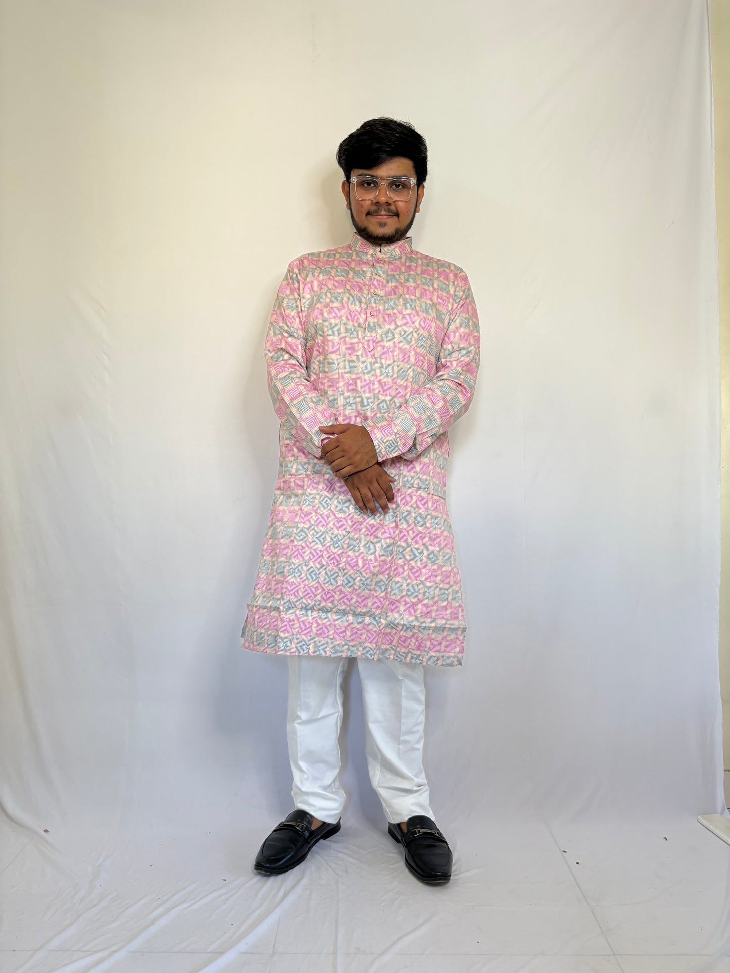 Men styling pastel spiral print kurta for haldi or college function – bold ethnic look
