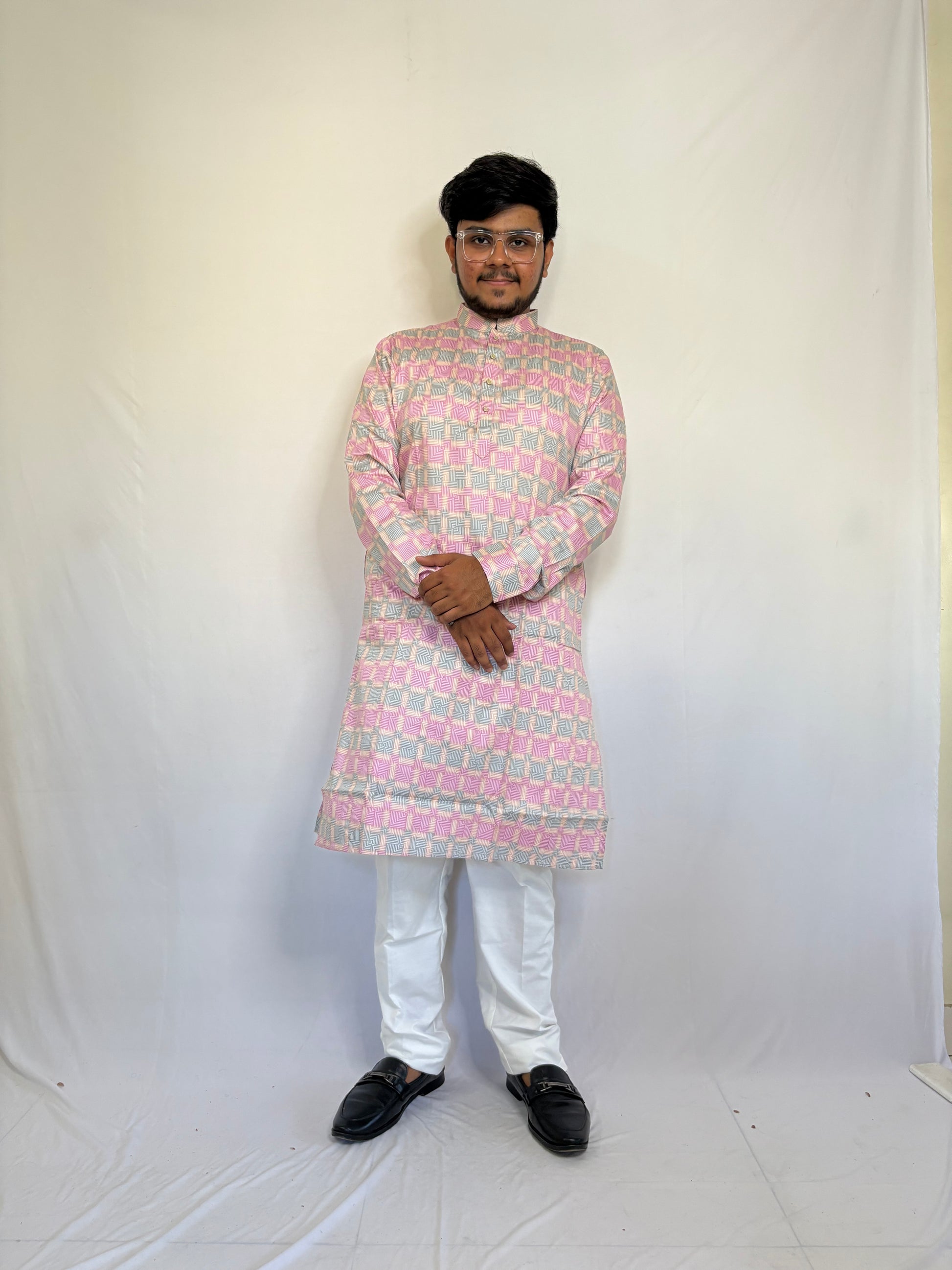 Men styling pastel spiral print kurta for haldi or college function – bold ethnic look
